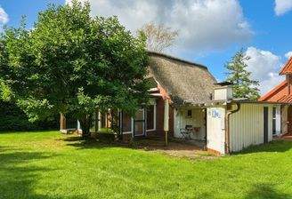 Gartenansicht Reetdachhaus