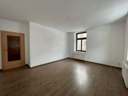 Wohnzimmer mit Balkon WE 3