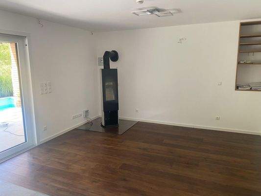 Wohnzimmer mit Holzofen