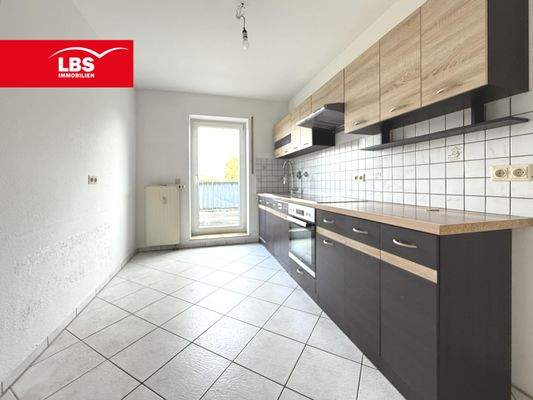 Küche mit Balkonzugang