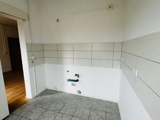 Küche mit Fliesenspiegel