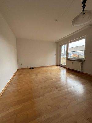 Wohnzimmer mit Balkon