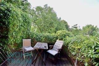 Küchenbalkon mit Zugang zum Garten 