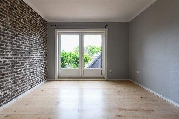 Schlafzimmer mit Balkon