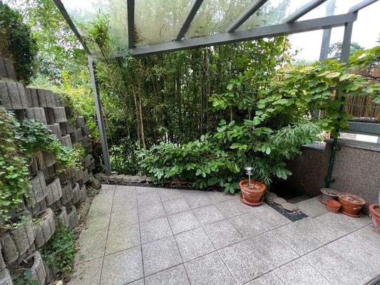 Terrasse mit Glasdach