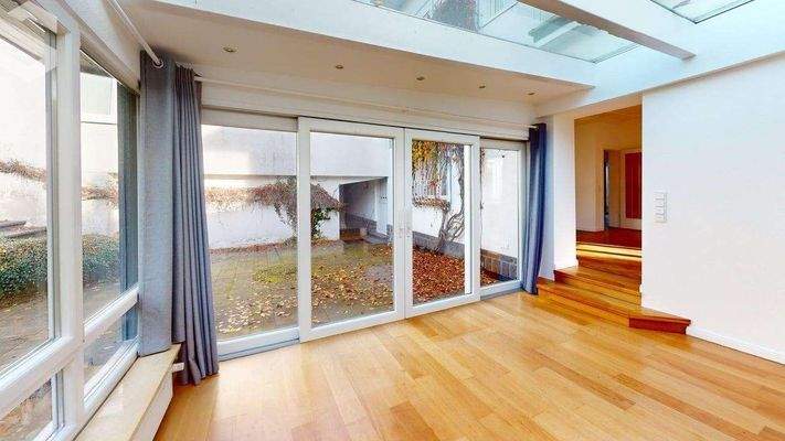 Wintergarten mit Zugang zur Terrasse