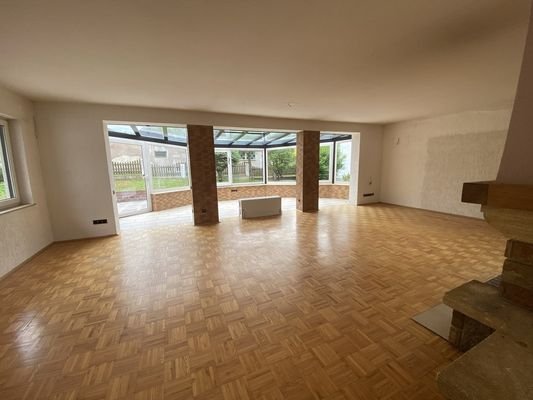 Wohnzimmer mit Wintergarten