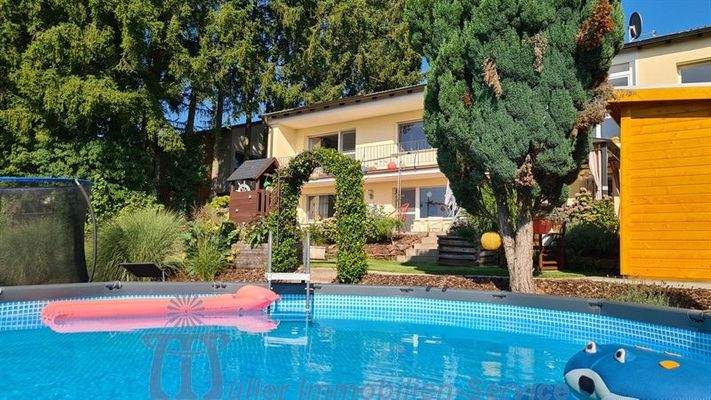 Foto 6_Pool - Rückansicht.jpg