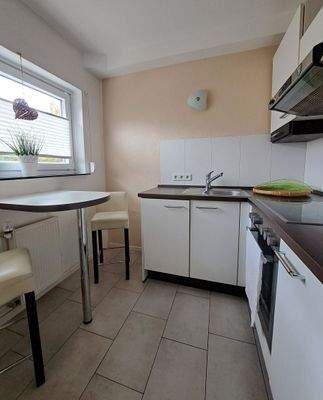 Küche mit gemütlichem Essplatz