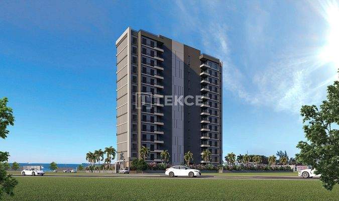 New Apartments in Mersin with a Pool and Modern Landscaping