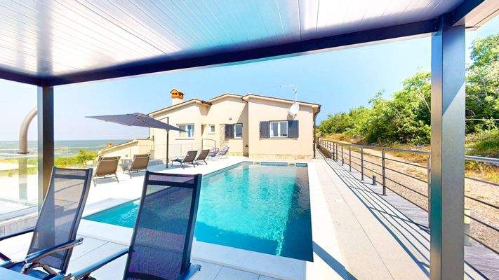 Sitzplatz/Pool mit Meerblick - Haus oben