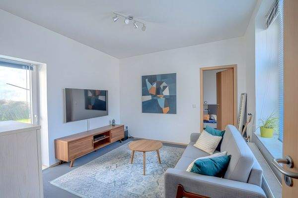 Wohnzimmer digital möbliert