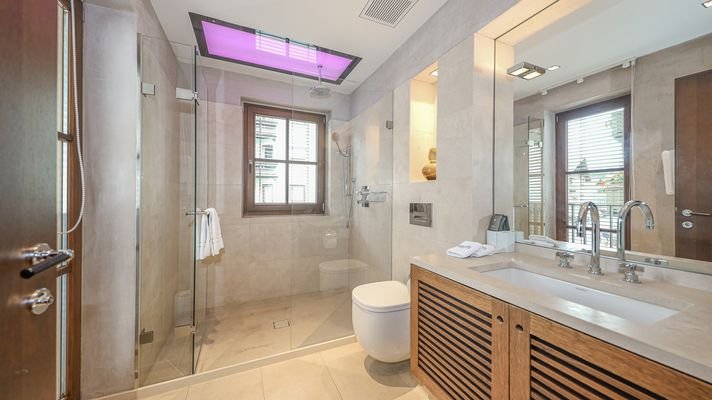 KITZIMMO-Luxus-Suite mit Zugang in ein 5-Sterne-Hotel - Immobilien Kitzbühel.