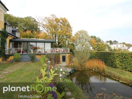 Wintergarten und Gartenflächen
