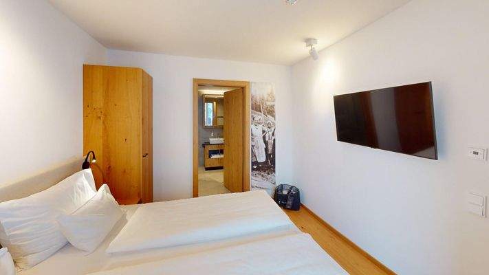 Apartment-201-ASR-FIEBERBRUNN-Bedroom 3.jpg