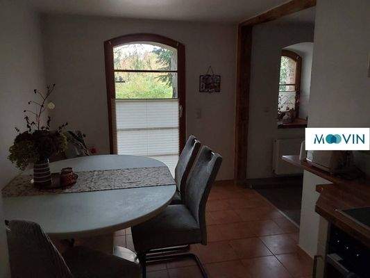 Ansicht III: Wohn- und Esszimmer mit offenem Küchenbereich