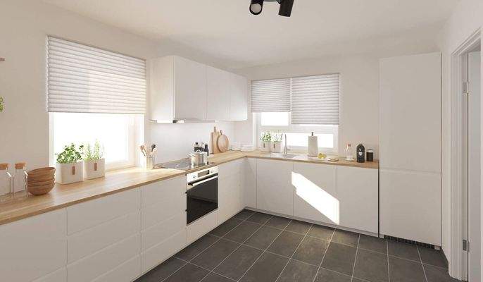 Die moderne Wohnküche lädt zum gemeinsamen Kochen ein