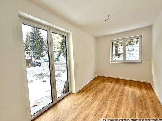 Zimmer mit Zugang in den Garten