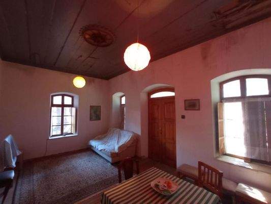 Kreta, Neapoli: Großes Steinhaus mit unvollendetem Gästehaus, Olivenhain und Garten zu verkaufen