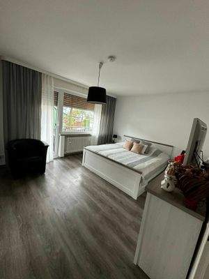 Schlafzimmer mit Balkon