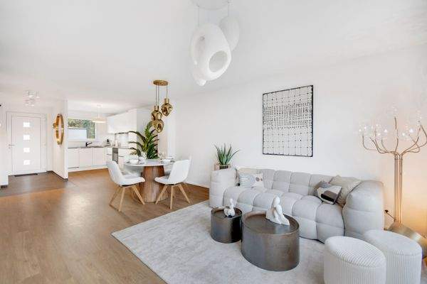 Wohnzimmer mit Sicht Küche und Eingang.jpg