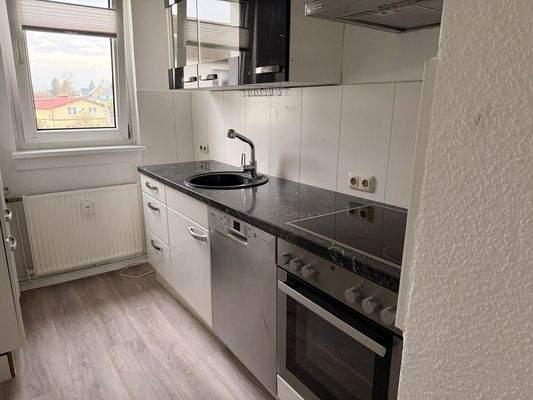 Küche mit Einbauküche