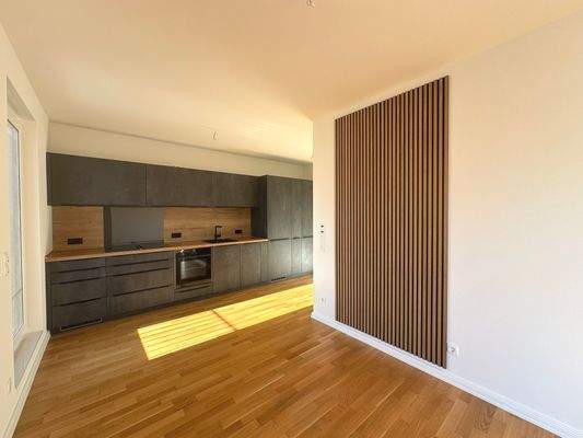 Offen gestalteter Koch- und Wohnbereich