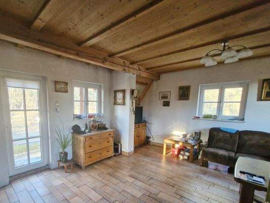 Wohnbereich mit Glastür zur Terrasse OG