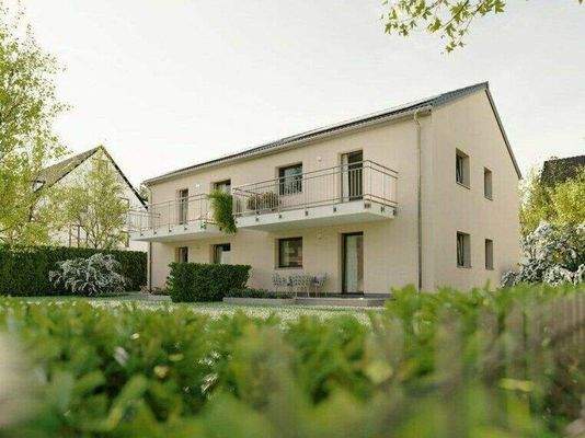 4-Familienhaus Gartenansicht.jpg