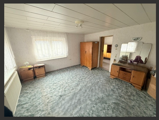 Schlafzimmer mit Ankleideraum.png