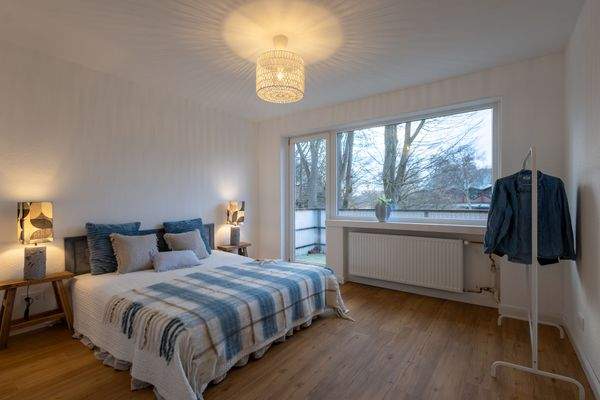 Schlafzimmer mit Balkon