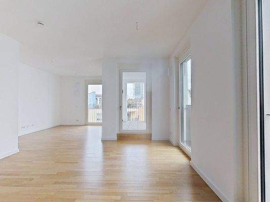 Ansicht II: Wohn- und Esszimmer mit offenem Küchenbereich