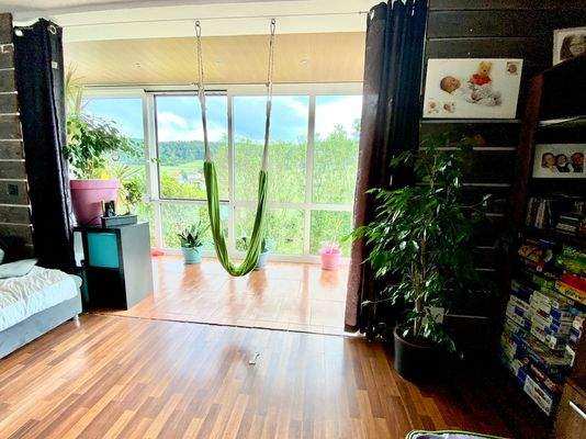 Wohnzimmer mit Zugang Wintergarten