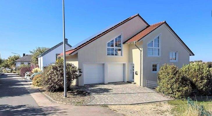 Einfamilienhaus mit Einliegerwohnung in Gilzem