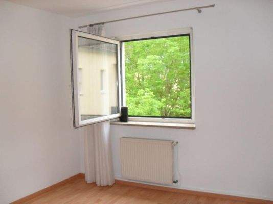 Wohnzimmer zur Südseite in den Gemeinschaftsgarten