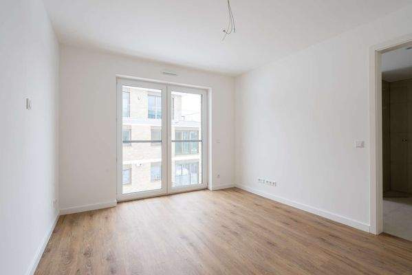 Schlafzimmer 1 mit Bad en Suite