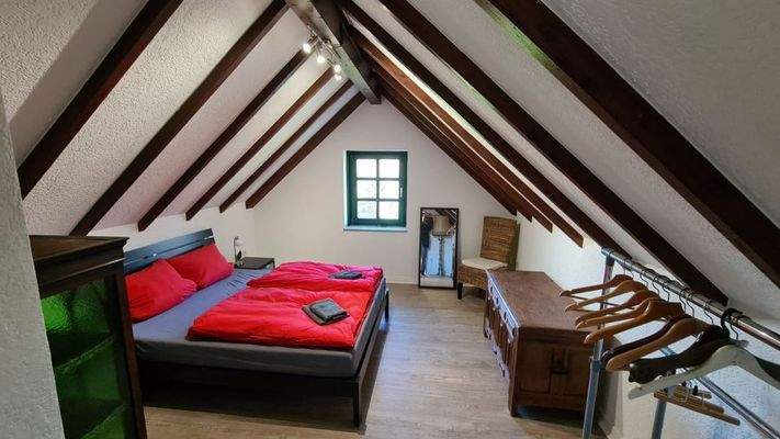 Schlafzimmer Ferienwohnung Spitzboden