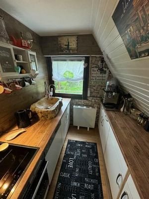 11 innen mit Balkon Küche Bad etc (12)