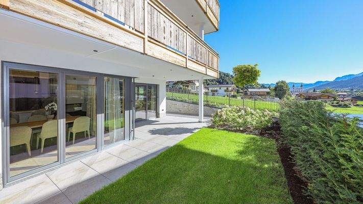 KITZIMMO-Luxuriöse Gartenwohnung mit eigenem Wellnessbereich - Immobilien Brixen.
