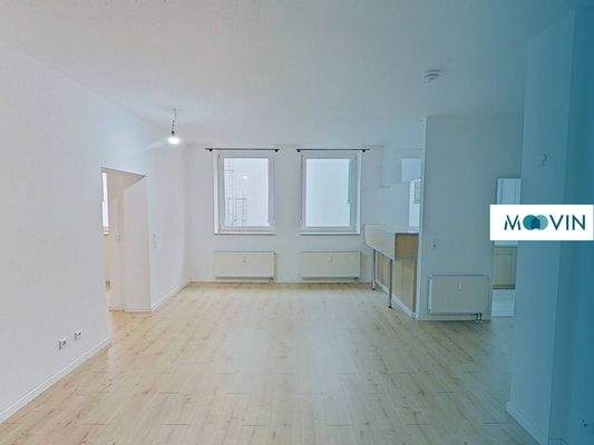 Ansicht I: Wohn- und Esszimmer mit offenem Küchenbereich