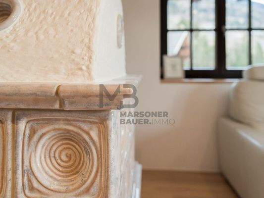 Detail Holzofen im Obergeschoss - dettaglio stufa a legna al piano superiore