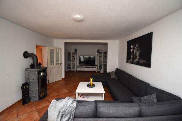 Wohnzimmer mit Specksteinofen