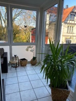 Wintergarten mit Ausgang zum Balkon