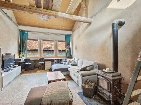 Wohnzimmer mit Lehmwand