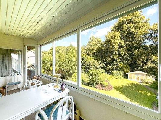 Wintergarten mit Gartenblick
