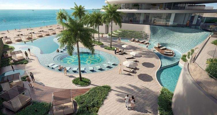 Gemeinschaftlicher Pool mit direktem Strandzugang