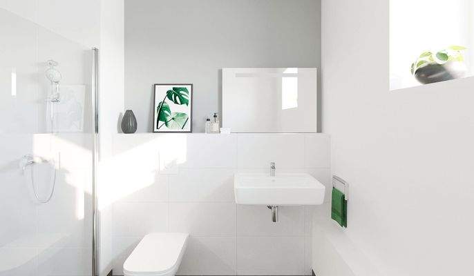 Ein modern gefliestes Badezimmer mit bodengleicher