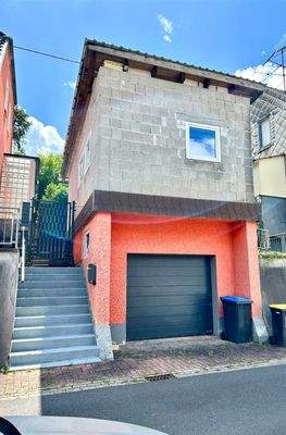 Garage mit ausgeb. Raum