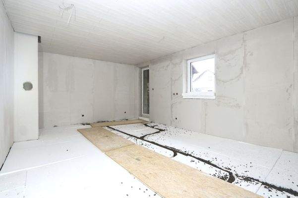 das Wohnzimmer mit Kaminzug