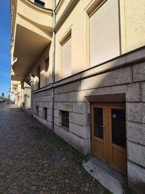 Putzfassade und Wirtschaftseingang